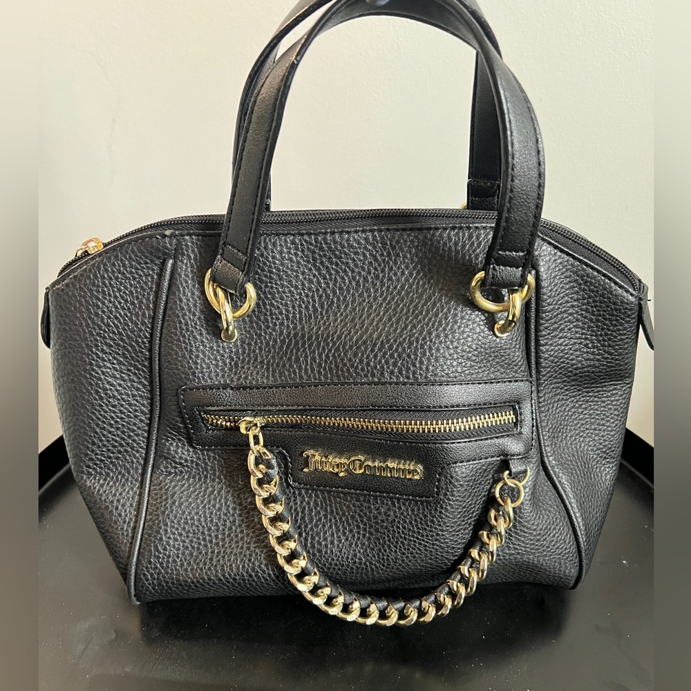 Juicy Couture handbag with long strap.